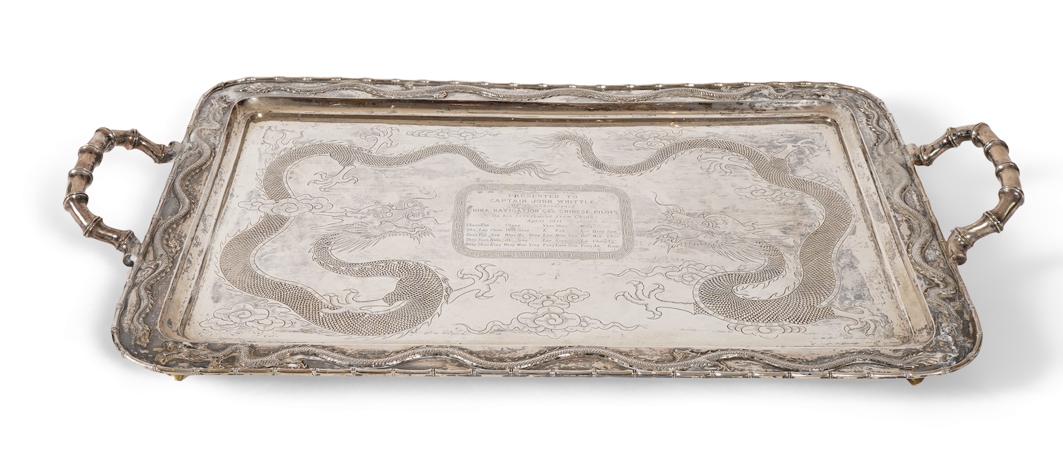 An early 20th century Chinese Export white metal two handled rectangular tea tray, by Luen Wo, Shanghai, with engraved presentation inscription, 'Presented to Captain John Whittle by the undersigned China Navigation Cos.
